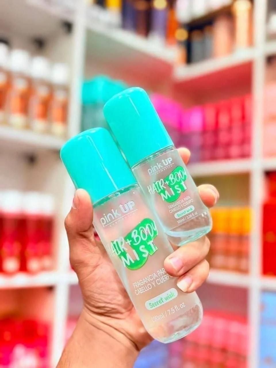 زجاجتان من معطر شعر وجسم بينك اب سيكرت ويش بغطاء فيروزي شفاف بحجمين مختلفين